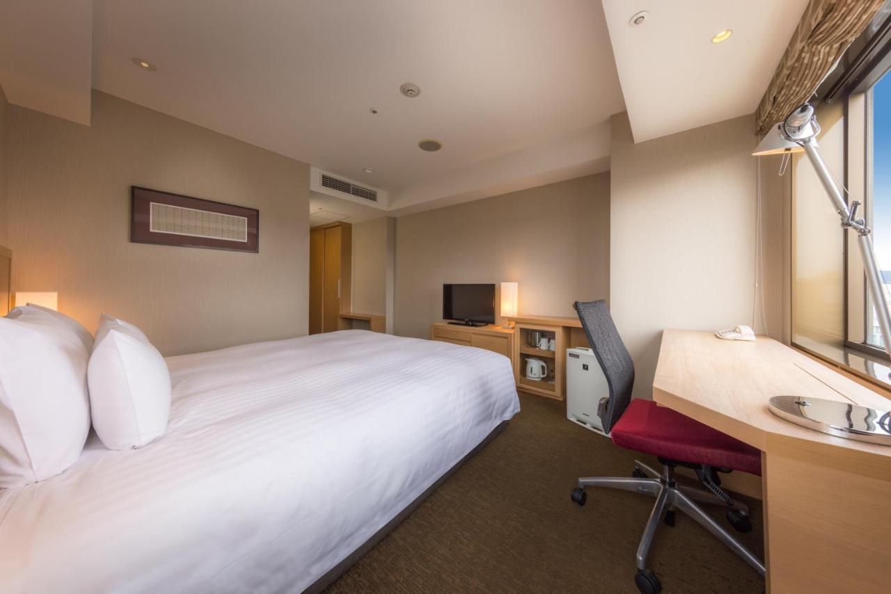 Hotel Associa Шідзуока Екстер'єр фото A room at Hotel Keihan